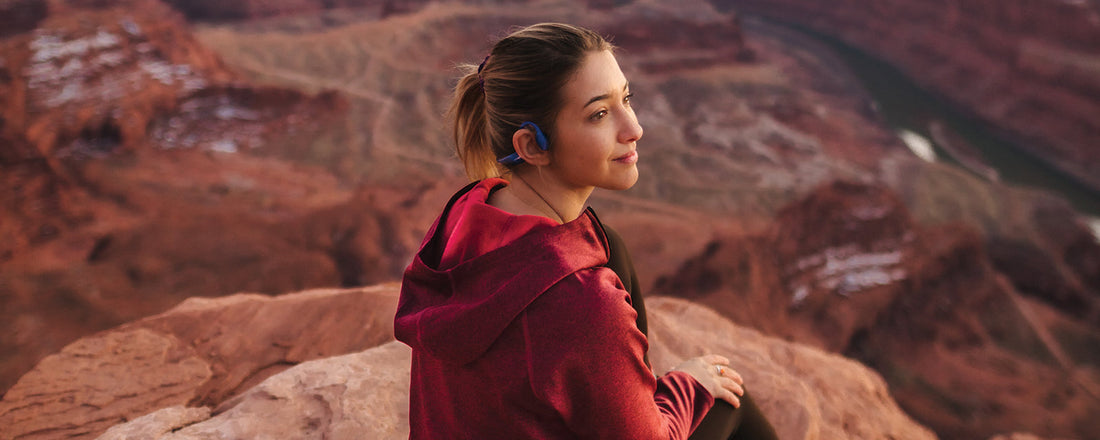 Woman wearing Aeropex practicing meditation