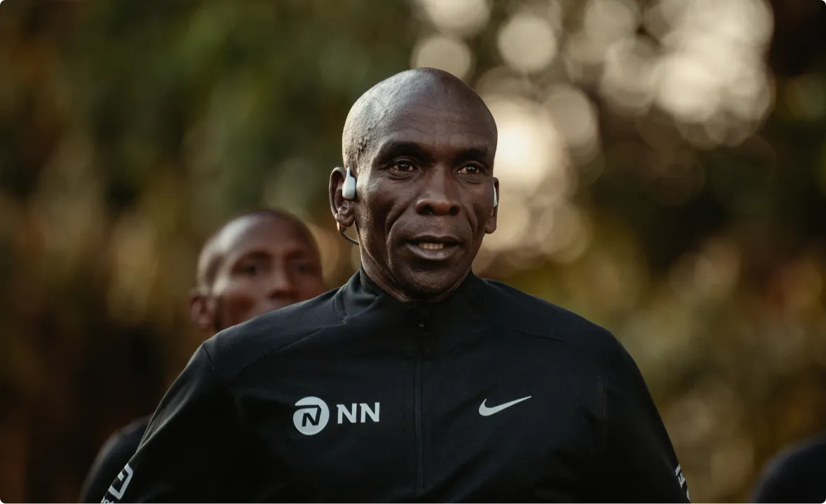 Eliud Kipchoge Running with Shokz Sports Headphones