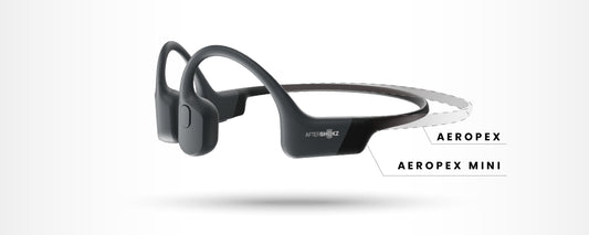 Image showing size difference of Aeropex Mini wireless headphones