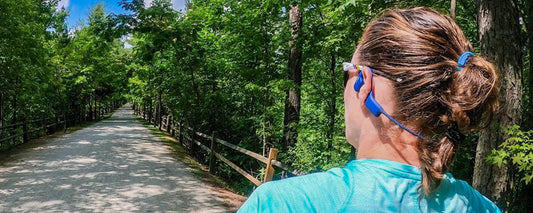 Elite triathlete Katie Zaferes wearing AfterShokz Xtrainerz headphones