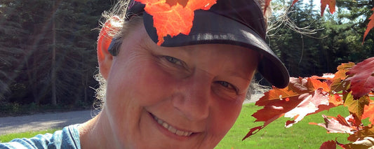 ShokzStar Sandy Stiner wearing AfterShokz Aeropex wireless headphones