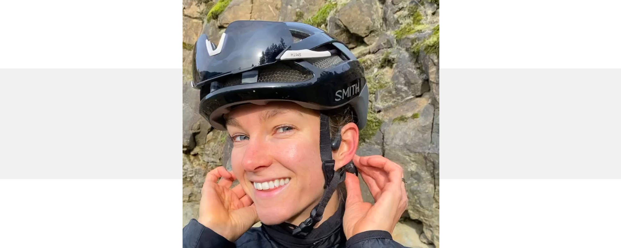 Professional Canadian biker Haley Smith wearing bike helmet and Shokz OpenRun Pro wireless headphones