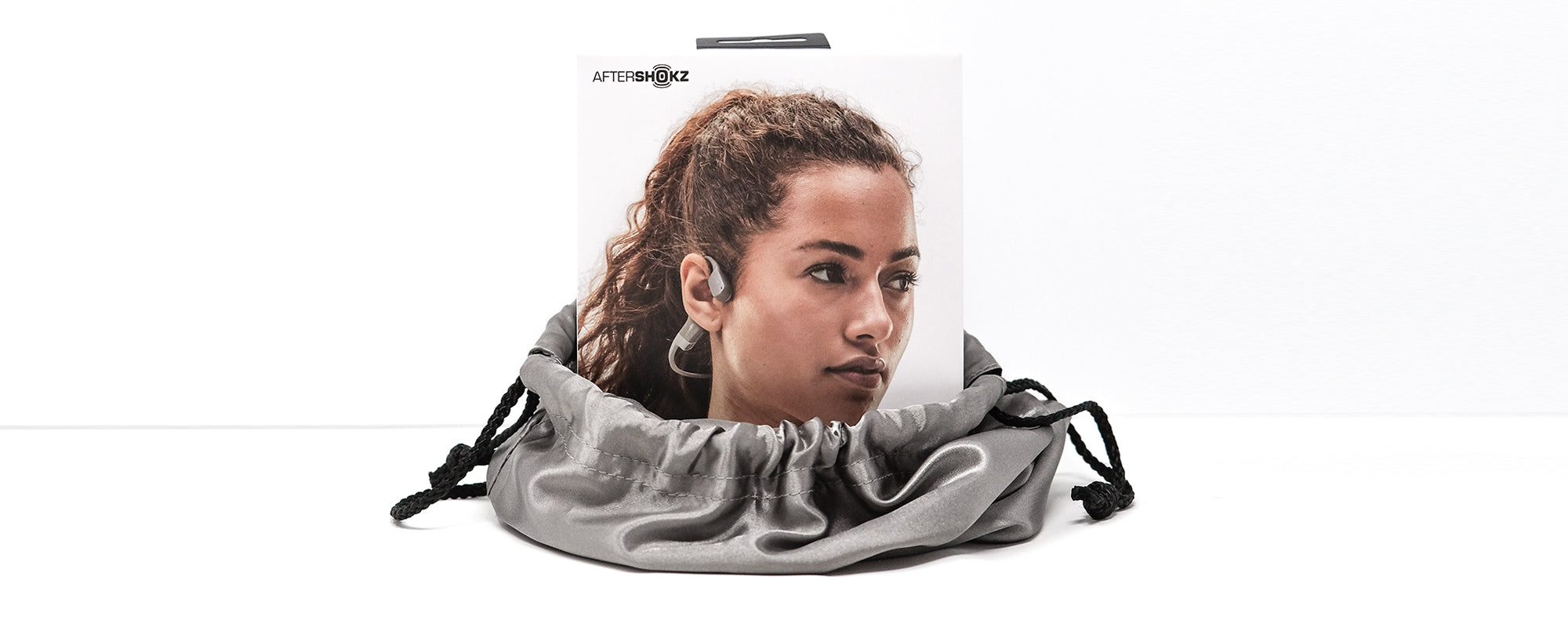 AfterShokz wireless headphones package inside of a gift bag